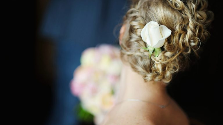 a woman with a flower in her hair