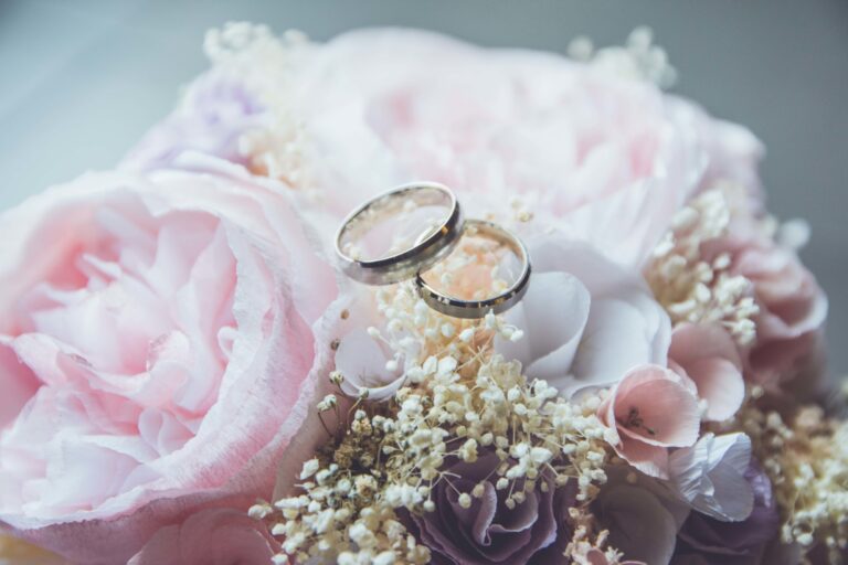 two rings on a bouquet of flowers