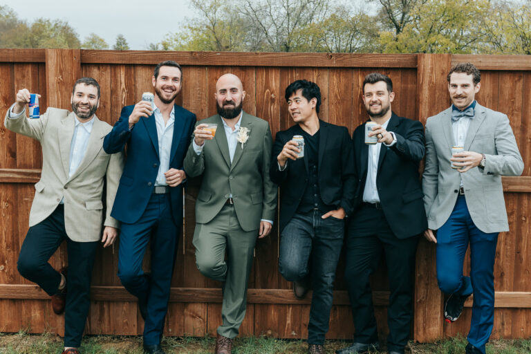 a group of men standing next to each other