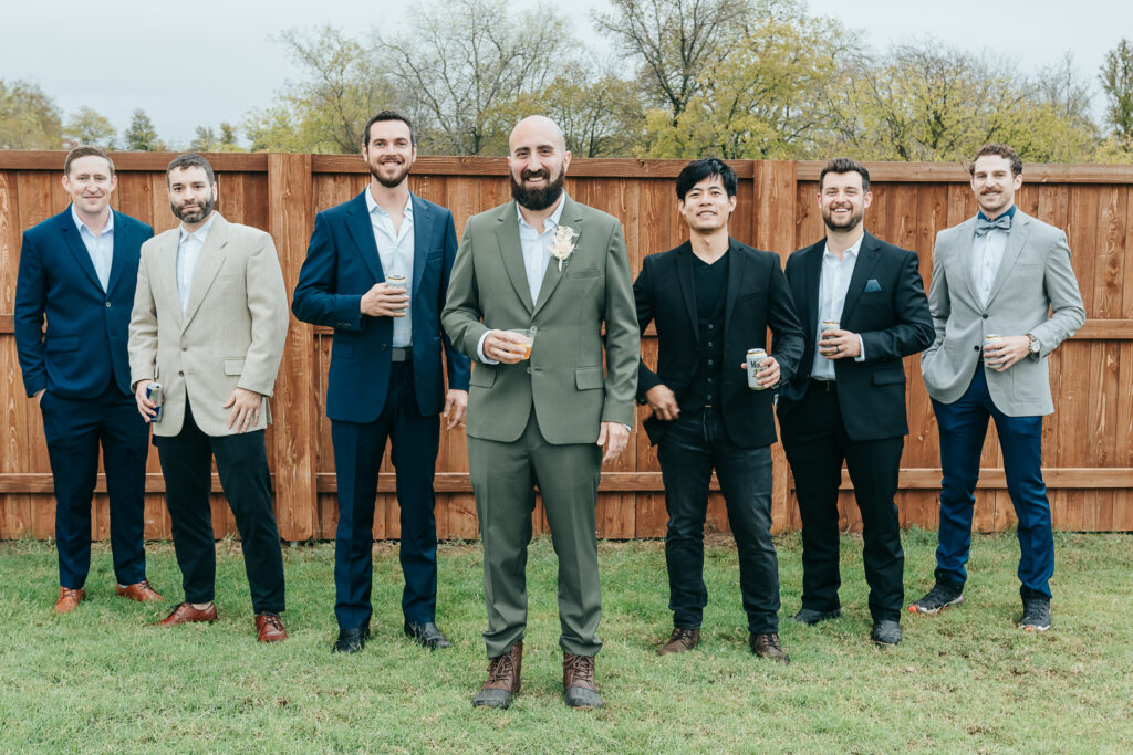 a group of men standing next to each other