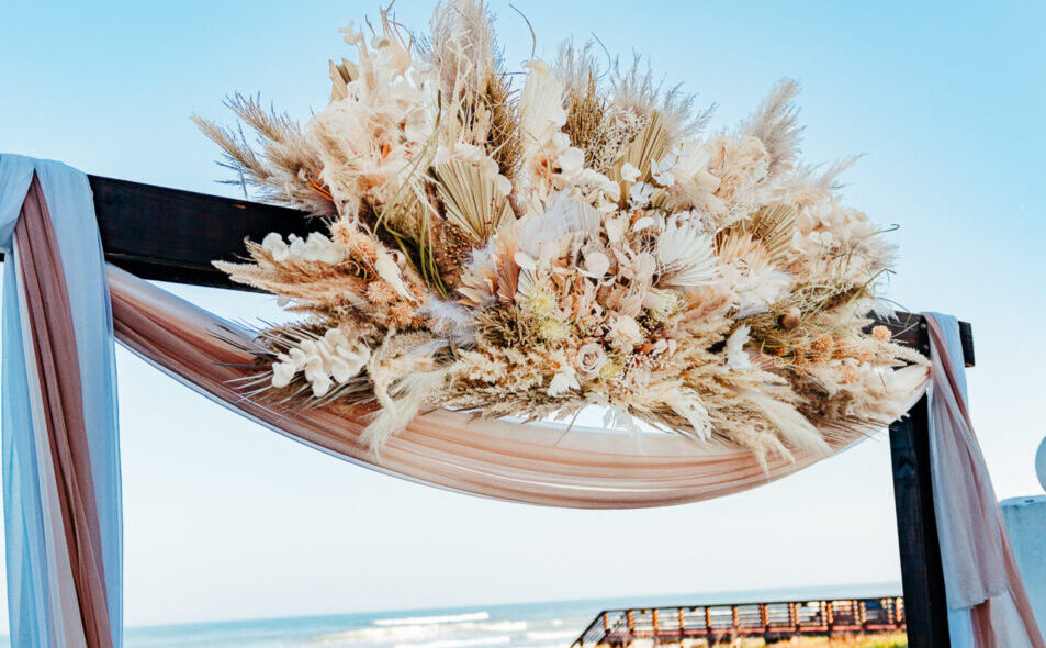 picture of Boho wedding arch at the South Padre Island Beach Wedding Venue