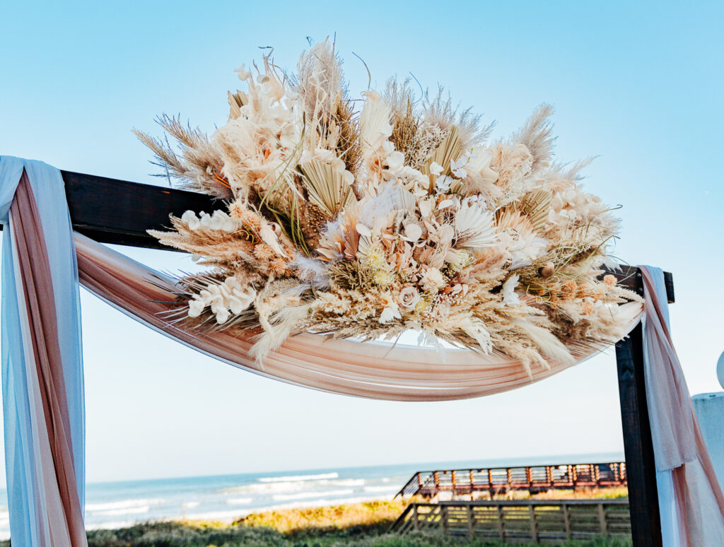 picture of Boho wedding arch at the South Padre Island Beach Wedding Venue