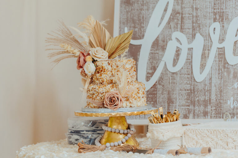 a wedding cake is displayed on a table