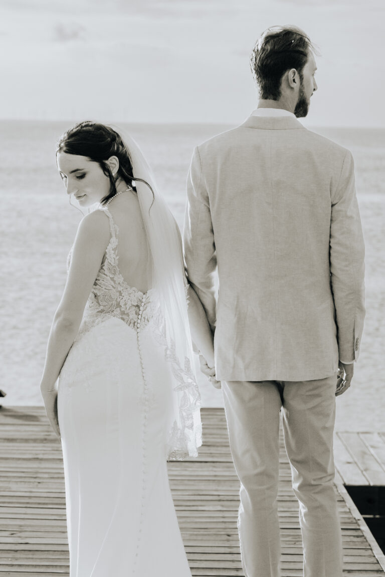 a man and woman holding hands