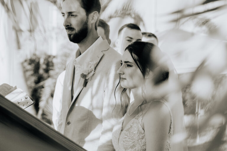 a man and woman standing next to each other